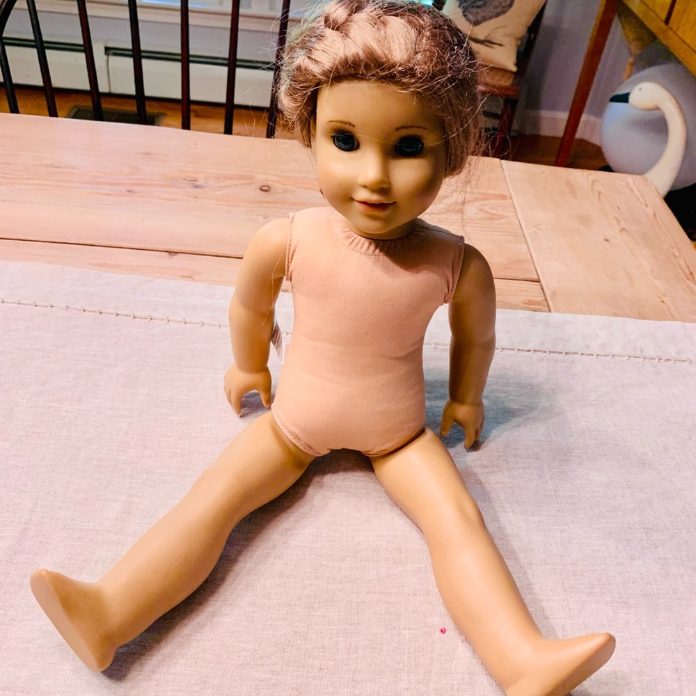 American Girl Doll Light tan skin, light brown red tinted hair, blue eyes toy